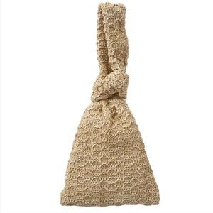 Carey Wristlet Handbag Natural Raffia
Dolce Vita